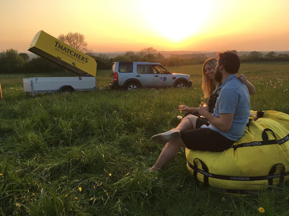 Couple drinking champagne on landing